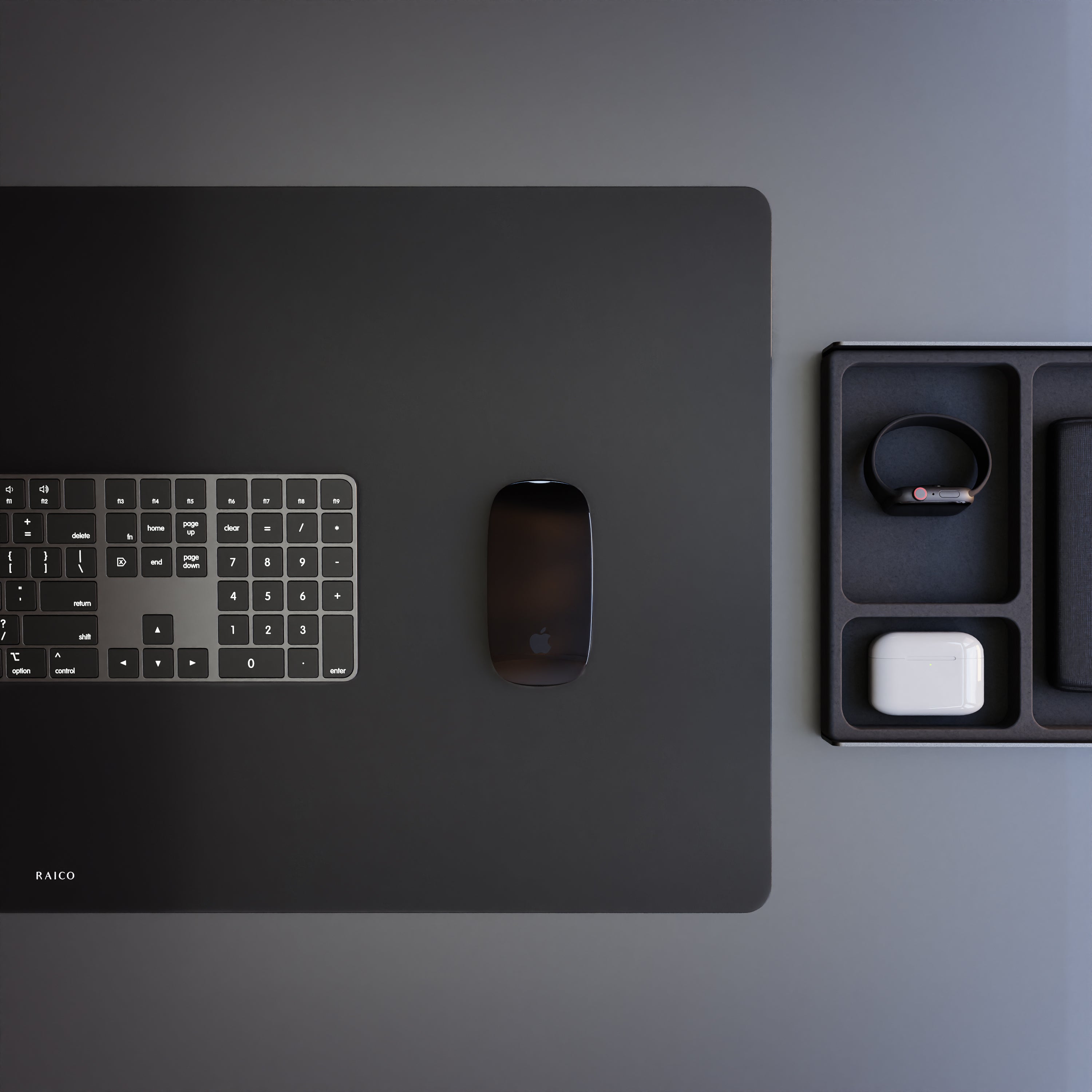 black leather desk mat next to grovemade desk tray